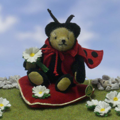 Lucky Ladybird sitting on a Heart 15 cm Teddy Bear by Hermann-Coburg
